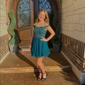 Emerald green mini dress with gold detailing!